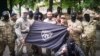 Бойцы батальона «Крым», в центре (за флагом) командир Иса Акаев