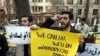 Iranian students stage a demonstration outside the UN office in Tehran in 2006 to protest one of the four rounds of international sanctions targeting Iran's nuclear activities.