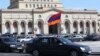 Armenia - Activists protesting against pension reform drive through Yerevan in a convoy of cars, 20Mar2014.