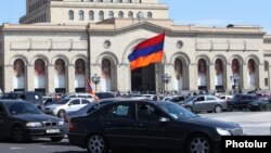 Armenia - Activists protesting against pension reform drive through Yerevan in a convoy of cars, 20Mar2014.