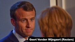 Emanuel Makron i Angela Merkel