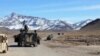 FILE: An Afghan army convoy in the southern province of Kandahar.