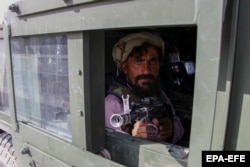 A Taliban fighter in Kandahar in 2021. The Taliban denies any revenge targeting of Raziq’s supporters or members of the Achakzai tribe.