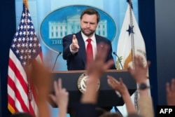 US Vice President JD Vance takes questions from reporters during a press briefing at the White House on June 18.