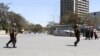 Afghanistan -- security personnel stand guard near the Communication Ministry as an attack between Afghan forces and attackers in central Kabul, 20Apr2019