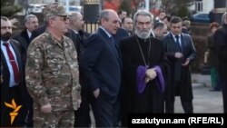 Nagorno-Karbakh - Karabakh's President Bako Sahakian (C) and spiritual leader Archbishop Pargev Martirosian attend a cocert in Stepanakert, 18Mar2014.