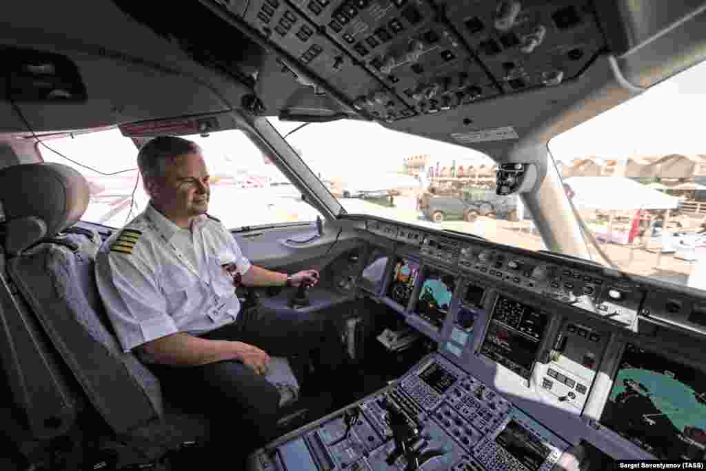 A pilot inside the Superjet&#39;s cockpit. Beginning in 2018, several Superjets have been grounded due to questions about the SaM146 engine.