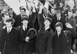 The Beatles у Міжнародным аэрапорце імя Джона Кэнэдзі ў Нью-Ёрку, 1964 год