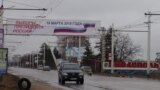 Imagine din Tiraspol, regiunea transnistreană, cu un banner de promovare a alegerilor prezidențiale din Federația Rusă din luna martie 2018.
