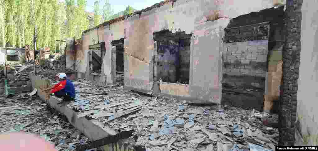 A burned-out house in the Tajik village of Somoniyon in the Isfara district on May 2. The violence along the Tajik-Kyrgyz border followed a dispute over the installation of surveillance cameras at a water distribution point near Tajikistan&#39;s Vorukh exclave, drawing in security forces from both countries.&nbsp;