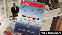 The reformist Seda magazine was reportedly shut down after it ran a photo of U.S. warships in the Persian Gulf next to a headline describing the situation as At The Crossroads Between War And Peace. 