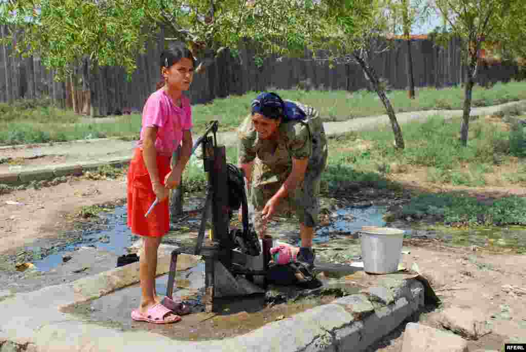 Azerbaijan - A single well provides bathing and drinking water for the more than 1,000 people living at the Imishli camp. Local doctors say there are frequent outbreaks of waterborne illnesses and stomach ailments at the camp due to contaminated water supplies. Occasionally the well dries up, leaving residents no option but to walk several kilometers to retrieve water in the Imishli city center. 