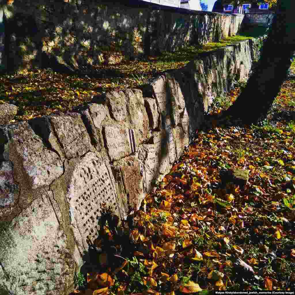 A Jewish cemetery in Austria that was systematically destroyed by Nazis. After the war, Austrian locals built a memorial and walls from the broken tombstones, an act Kiraly describes as &ldquo;a beautiful repentance by the Austrian people.&rdquo;