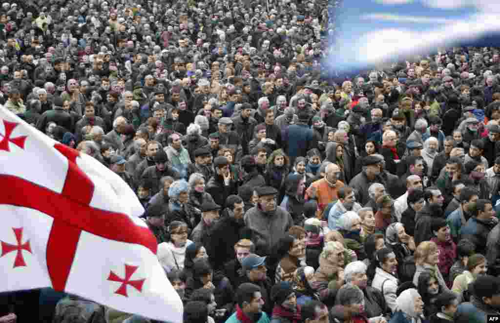 Georgian opposition protesters rally outside the Georgian parliament in Tbilisi on November 12. Several hundred protesters camped outside parliament for the fourth consecutive day as Shevardnadze signalled a tougher line on demonstrations calling for his resignation.