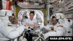 Astronaut Christina Koch (center), Nick Hague (left) and Anne McClain aboard the International Space Station on March 22.