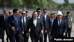 Президент Садыр Жапаров жана экс-мэр Жеңишбек Токторбаев. Архив.