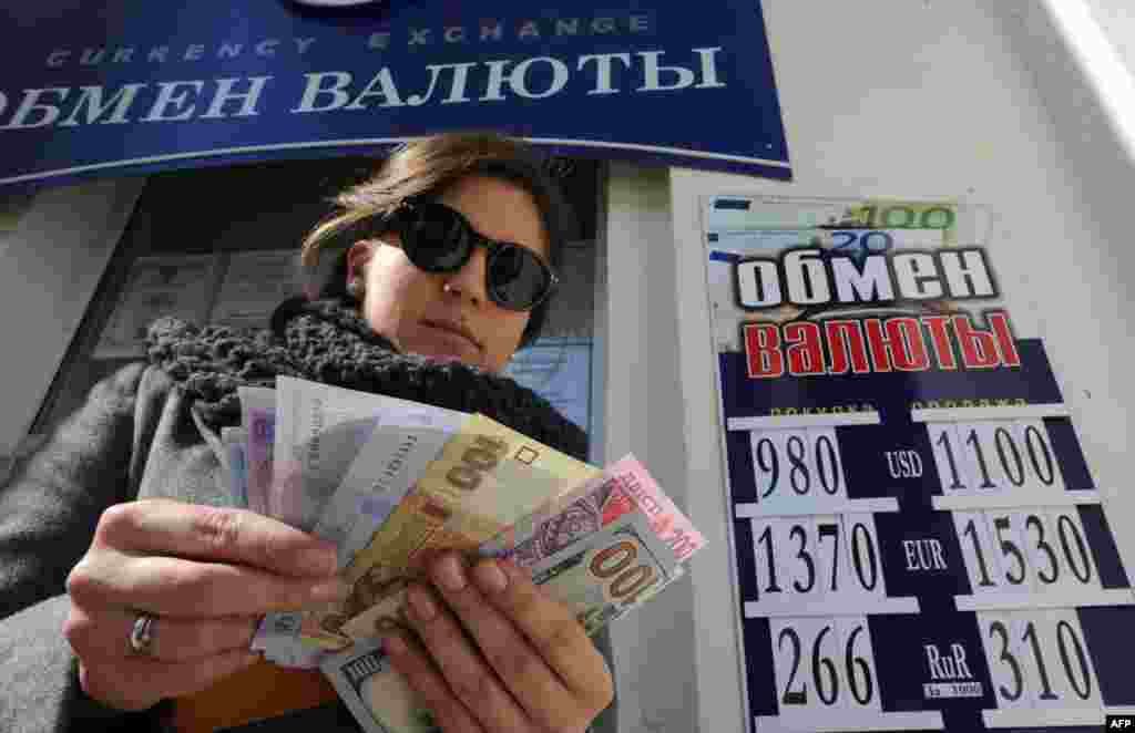 Крым в самое ближайшее время, как обещают его новые власти, готов отказаться от гривны и перейти на расчеты в рублях