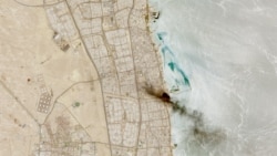 A satellite image shows smoke billowing near an oil facility in Ahmadi Governorate, Kuwait, on July 18.