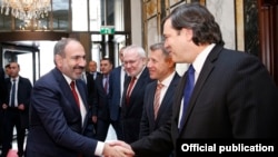 Austria -- Armenian Prime Minister Nikol Pashinian greets the U.S., Russian and French co-chairs of the OSCE Minsk Group before talks with Azerbaijan's President Ilham Aliyev, Vienna March 29, 2019.