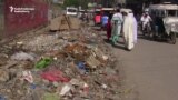 Garbage Piles Up In Pakistani Town As Collectors Strike