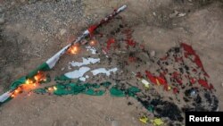 A burnt Kurdistan flag is seen in Kirkuk, Iraq, on October 16.