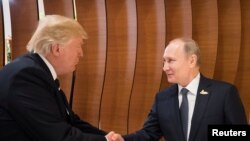 U.S. President Donald Trump (left) and Russian President Vladimir Putin at the G20 Summit in Hamburg on July 7.