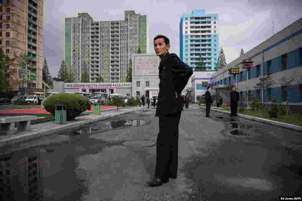 A guide photographed near the Electric Cable Factory in Pyongyang. There is also money to be made from state entities issuing permits for business people to operate on their behalf, often in completely unrelated industries. A state-run school factory, for example, might sell an entrepreneur the permit to open a mine.&nbsp;