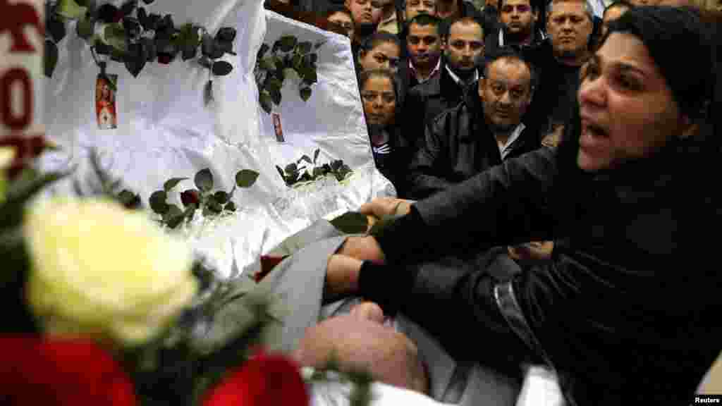 Wallachian Roma mourn their late king, Jan Lipa, before a holy mass in Ostrava, Czech Republic, on October 18. (REUTERS/Petr Josek)