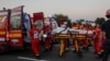 Rescuers work at the site of a fatal gas explosion in Crevedia, near Bucharest. 