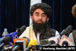 Taliban spokesman Zabihullah Mujahid at the militant group's press conference in Kabul on August 17