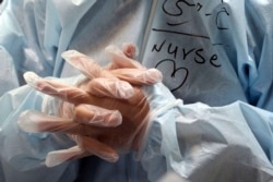 A nurse wears protective gear in a ward dedicated to coronavirus infections at a hospital in Tehran on March 8.