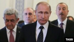 Russia -- Armenian President Serzh Sarkisian, Russian President Vladimir Putin and Azerbaijani President Ilham Aliyev meet to discuss the Nagorno-Karabakh settlement , in St. Petersburg, June 20, 2016