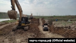 Будівництво греблі на річці Булганак у Ленінському районі Криму