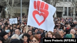 Protesters in Podgorica march against cuts in Montenegrin state aid for mothers of three or more children on International Women's Day 2017.