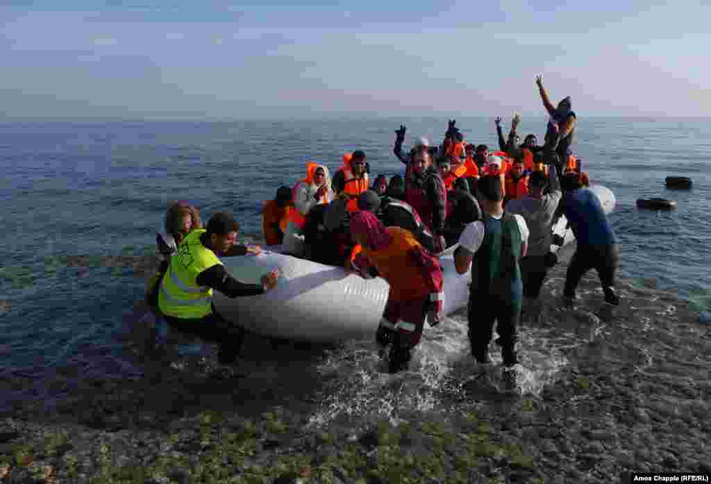 A migrant boat approaches the Greek island of Lesbos. In addition to the massing of people, Lesbos is trying to cope with the tide of inflatable boats on which the migrants arrive. 