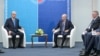 Касым-Жомарт Токаев (слева) и Владимир Путин на форуме в Омске. 27 июля 2026 года