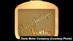 Bar owner Brian Ingberg is quoted as saying the stolen bottle was one that replicated the shape of the front grill of a Russo-Balt automobile produced in Riga from 1908 to 1912.