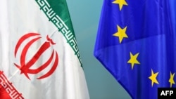 پرچم اتحادیه اروپا و پرچم جمهوری اسلامی ایران
