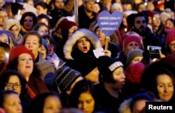 Demonstrators in Brussels, mostly women, attend a rally protesting against U.S. President Donald Trump on the day of his inauguration. Hundreds of similar events are due to be held around the world on January 21, in solidarity with a "Women's March On Washington," which is expected to attract tens of thousands of people.
