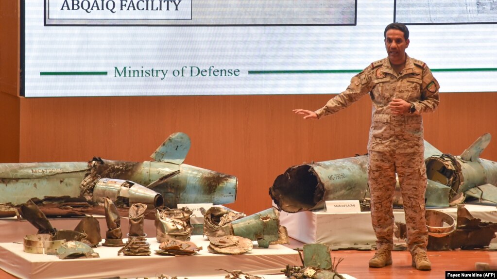 Saudi defense ministry spokesman Colonel Turki bin Saleh al-Malki displays pieces of what he said were Iranian cruise missiles and drones recovered from the attack site that targeted Saudi Aramco's facilities. September 18, 2019