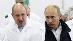 Yevgeny Prigozhin (solda) və Vladimir Putin