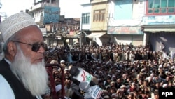 An Islamist leader addresses Swat residents after the establishment of Shari'a law