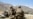 FILE: U.S. soldiers look out over hillsides during a visit of the commander of U.S. and NATO forces in Afghanistan General at the Afghan National Army (ANA) checkpoint in Nerkh district of Wardak Province in June.