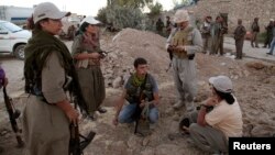 PKK fighters deploy against Islamic State militants on the front line in Makhmur in Iraq's Kurdish region iin August.