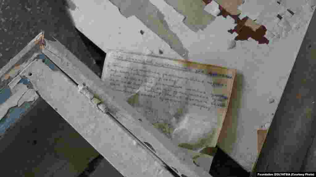 A letter left inside a damaged home