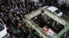 Funeral procession for a former Revolutionary Guard Commander in a township near Tehran, Iran, March 23, 2020.