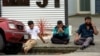 Members of the public react following a deadly mass shooting at the Al Noor mosque in Christchurch, New Zealand, on March 15. 