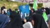 تصویر علی خامنه‌ای، رهبر کشته‌شدهٔ جمهوری اسلامی، در یک مراسم حکومتی در کرج