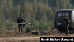 A Belarusian service member holds a drone during the joint Russian-Belarusian military exercises last month. 