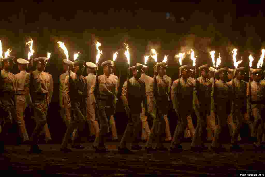 Indian Navy sailors take part in Navy Day celebrations in Mumbai on December 4. (AFP/Punit Paranjpe)